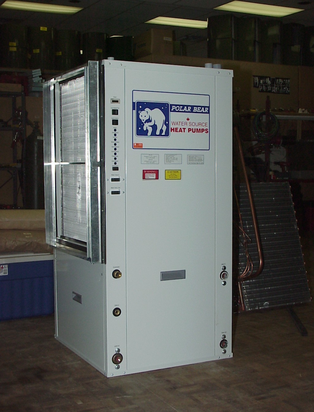 Original Polar Bear standard vertical water-to-air heat pump photographed in the manufacturer shop